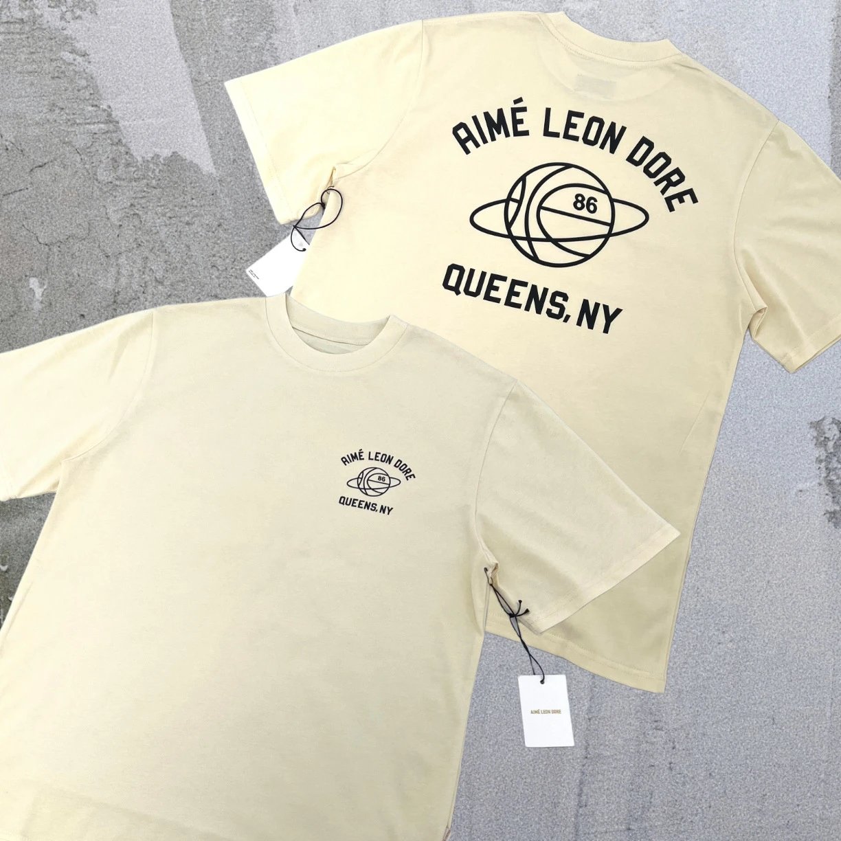 Aimé Leon Dore T-Shirts Short-sleeve logo graphic T-shirt — Apricot No. 86 Ball A05