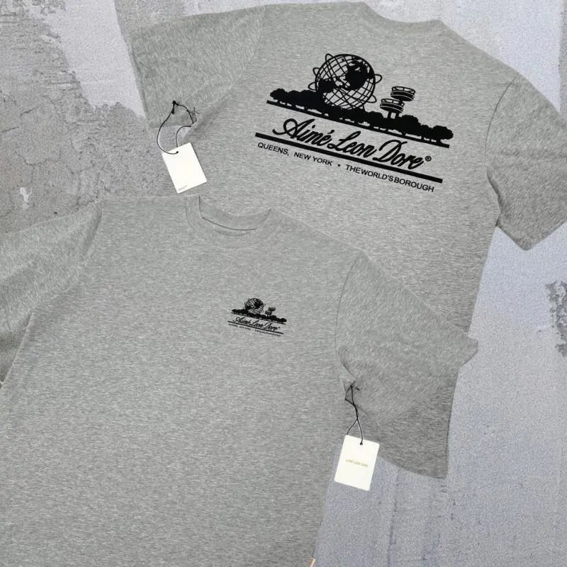 Aimé Leon Dore T-Shirts Short-sleeve logo graphic T-shirt — Landmark A01 behind the heather gray