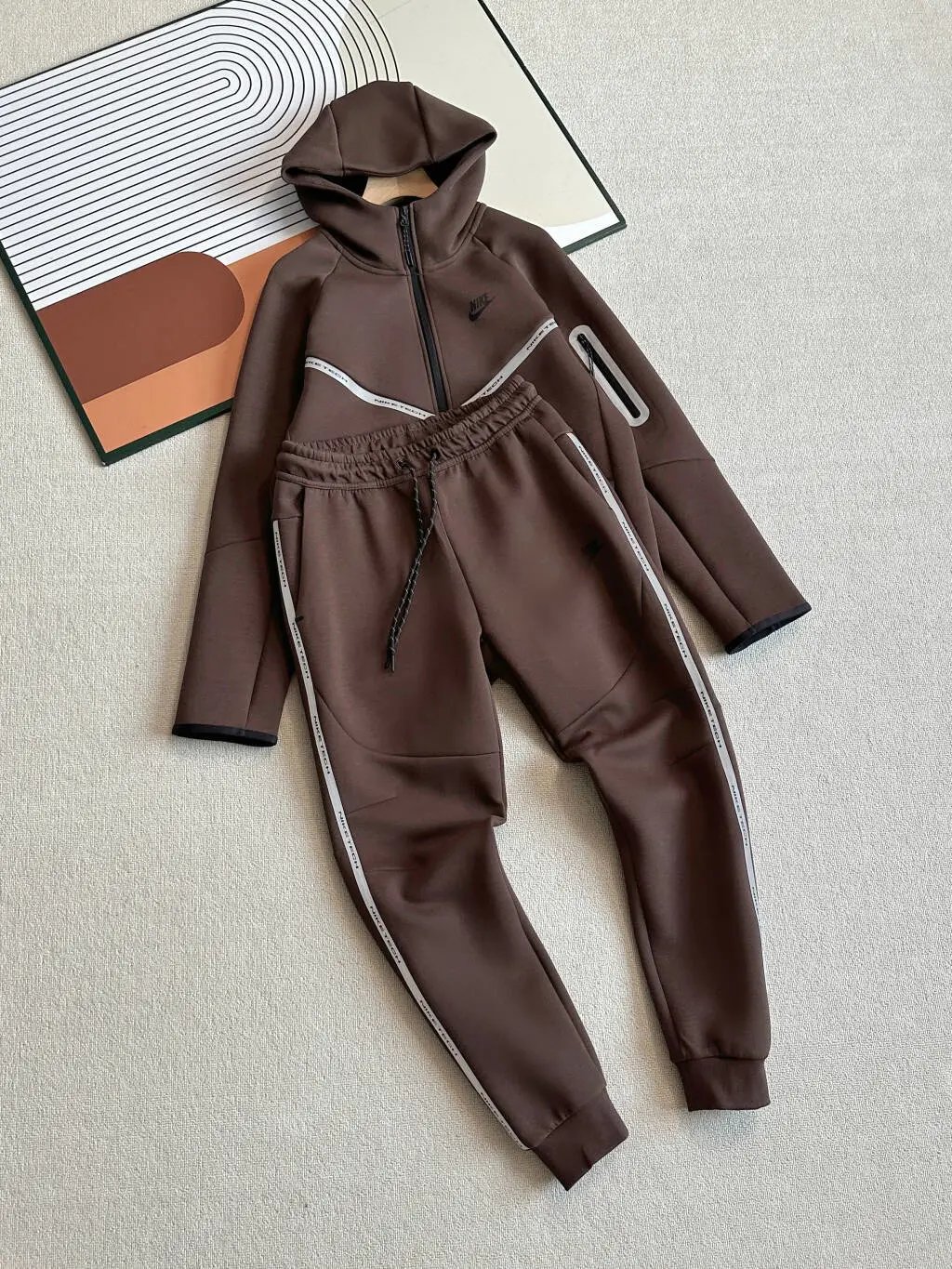 Nike Tracksuits NOCTA hooded zip-up tracksuit — 04 Reflective Strip Dark Brown Zip Sweat
