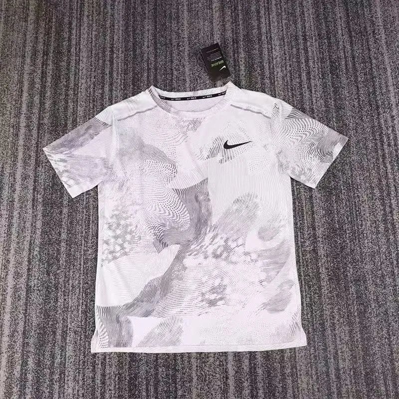 Nike T-Shirts Short-Sleeve Ankle Skeleton Graphic T-Shirt — White short-sleeved shirt