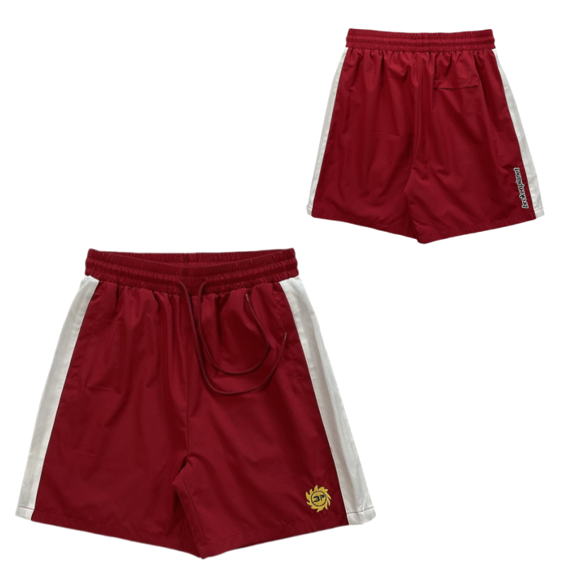 Broken Planet Shorts Drawstring athletic with contrast side panels — A 7 Red