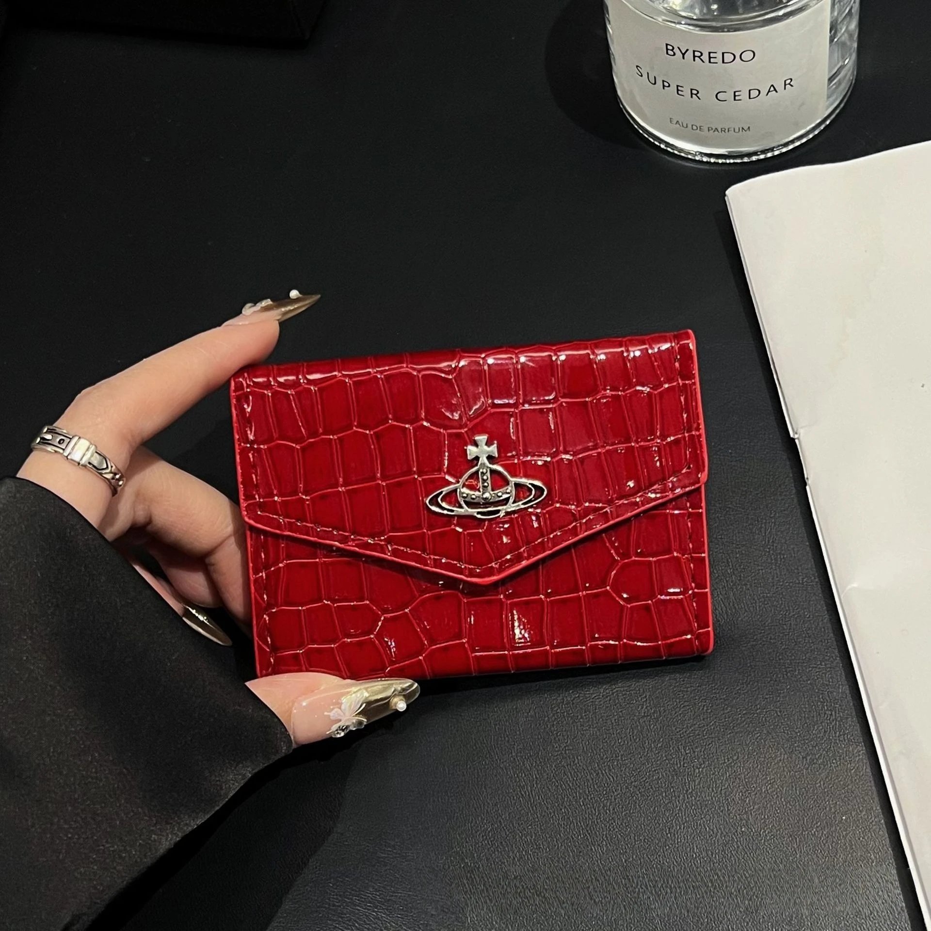 Unbranded Wallets & Card Holders Crocodile-Embossed Holder with Rhinestone Ring Emblem — Accordion cardholder, red crocodile-patterned, with hollowed-out Western-style emblem