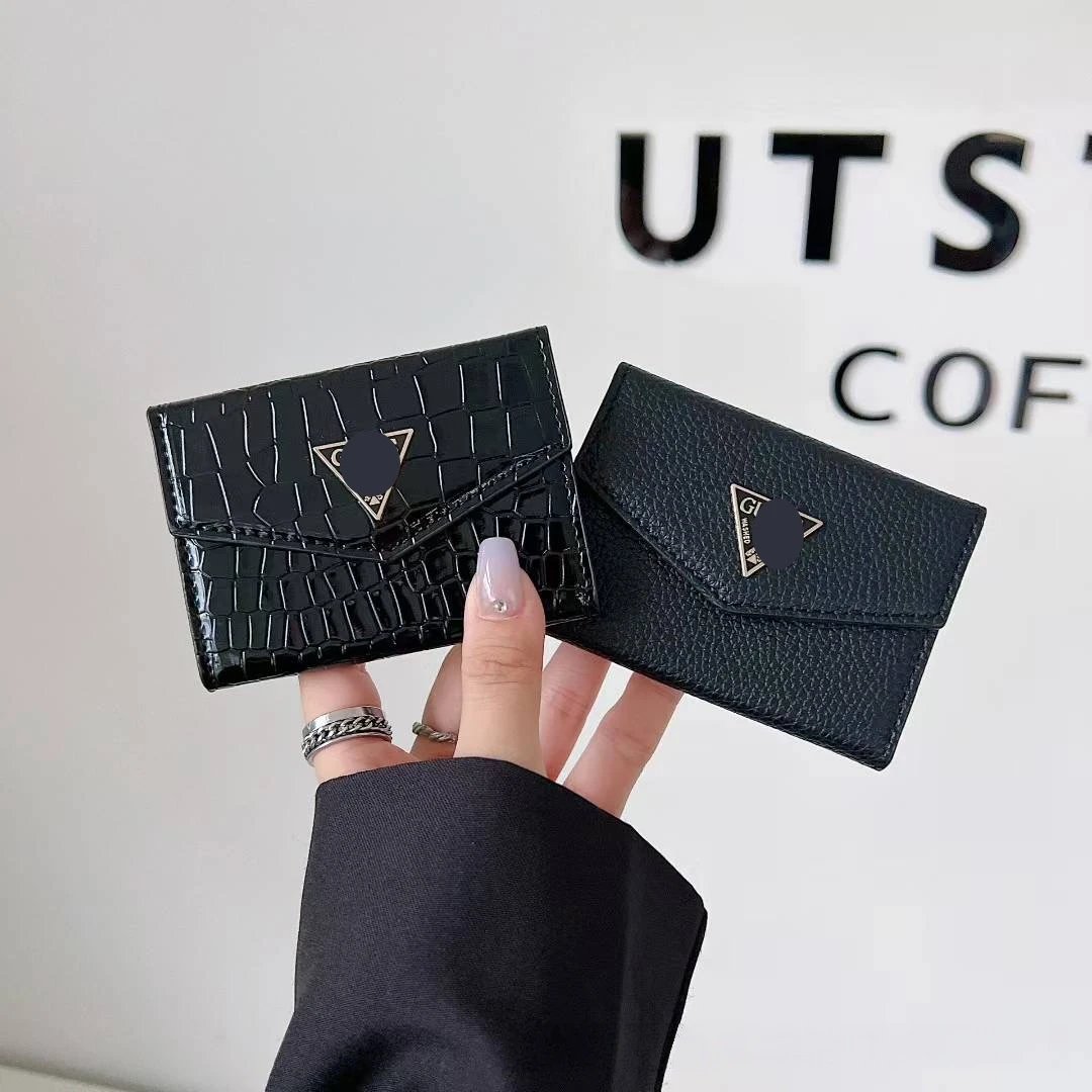 Unbranded Wallets & Card Holders Crocodile-Embossed Holder with Rhinestone Ring Emblem — Crocodile-pattern Gail’s handbag