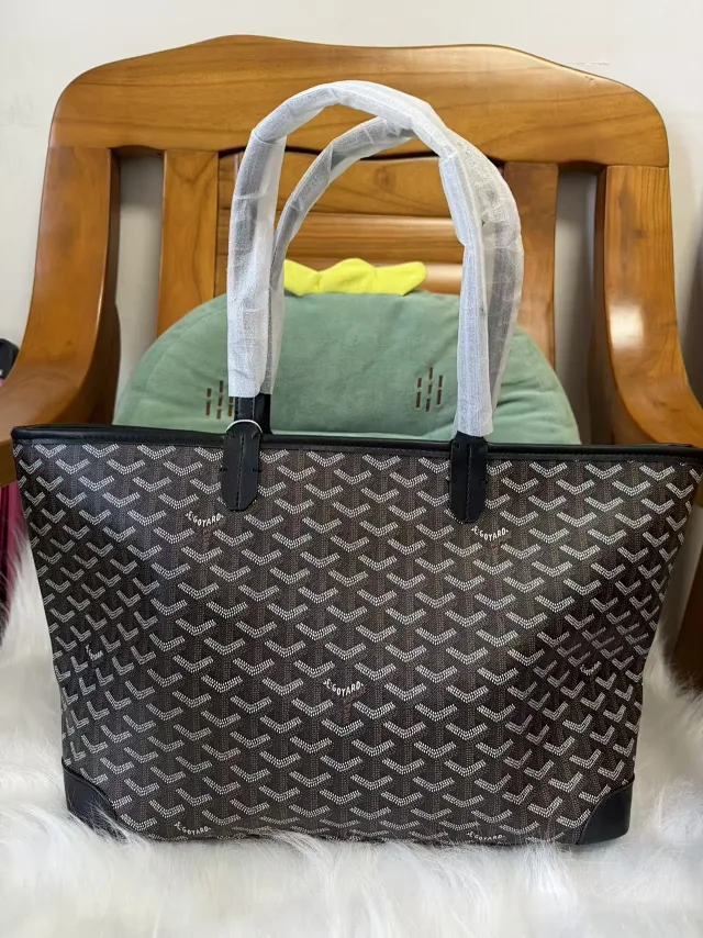 Goyard Backpacks Chevron-pattern flap backpack with top handle product detail image 52