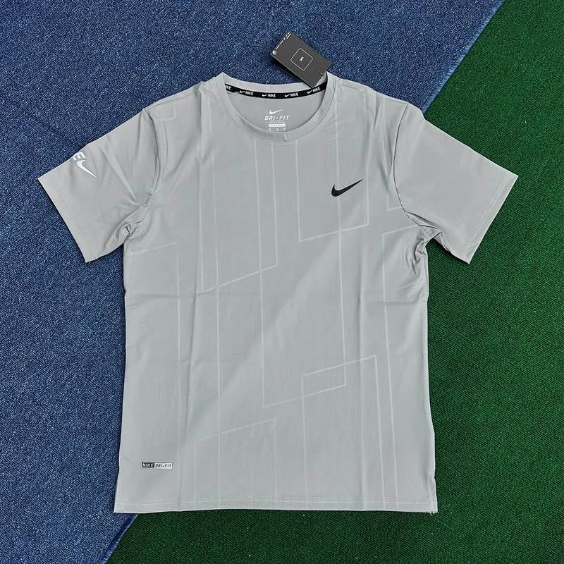 Nike T-Shirts Short-Sleeve Ankle Skeleton Graphic T-Shirt — Gray short-sleeved shirt with vertical stripes
