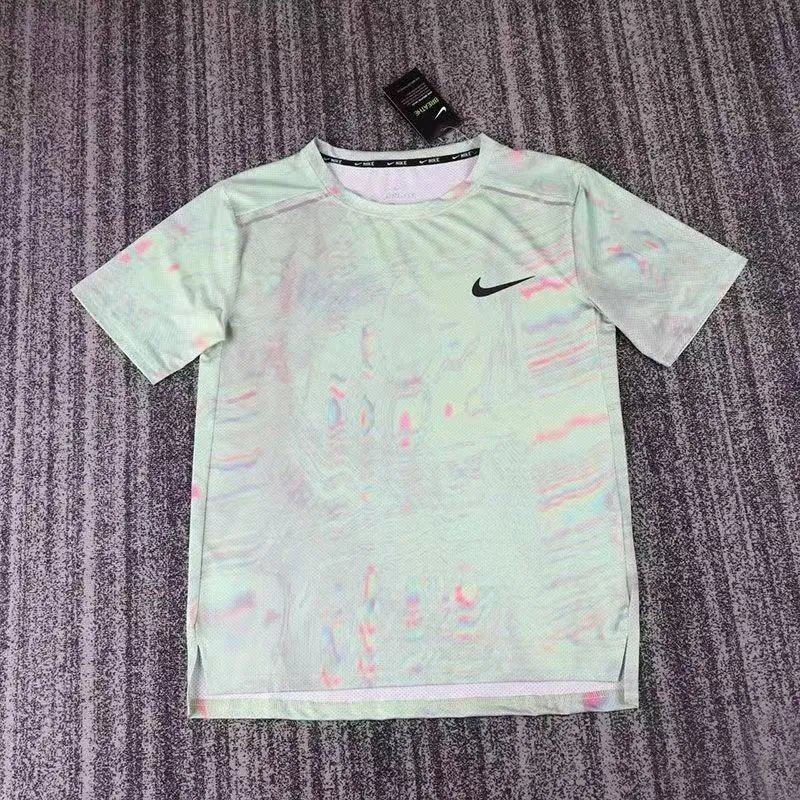 Nike T-Shirts Short-Sleeve Ankle Skeleton Graphic T-Shirt — Green short-sleeved shirt