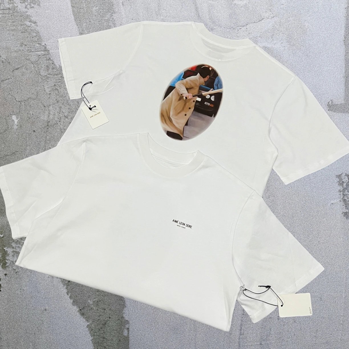 Aimé Leon Dore T-Shirts Short-sleeve logo graphic T-shirt — White Movie Character A18