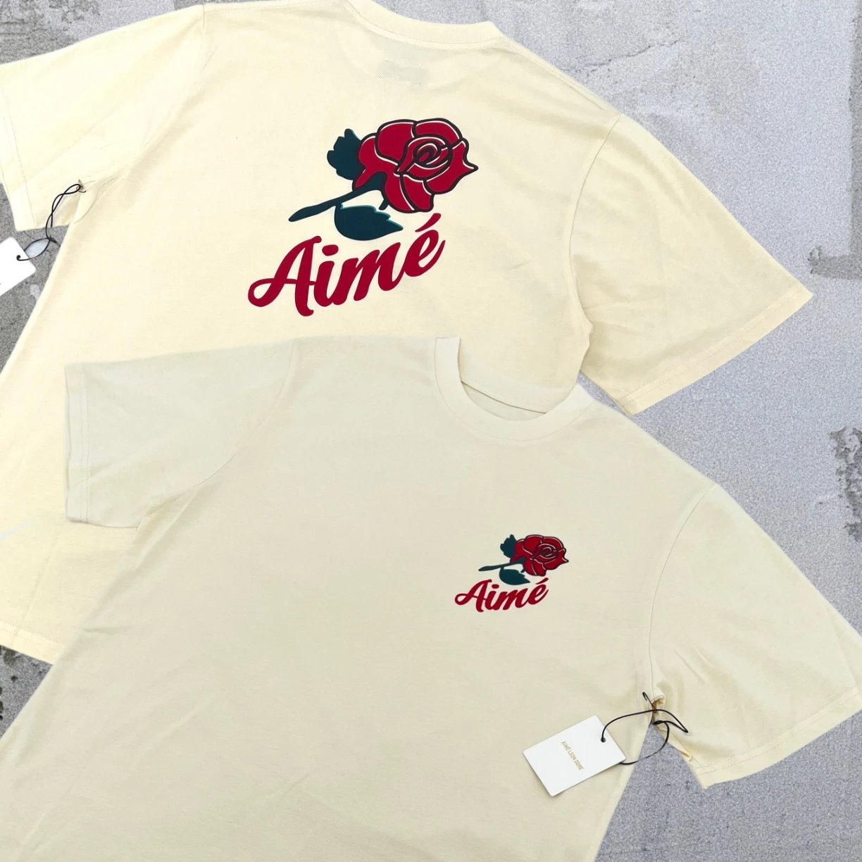 Aimé Leon Dore T-Shirts Short-sleeve logo graphic T-shirt — Apricot Rose A03