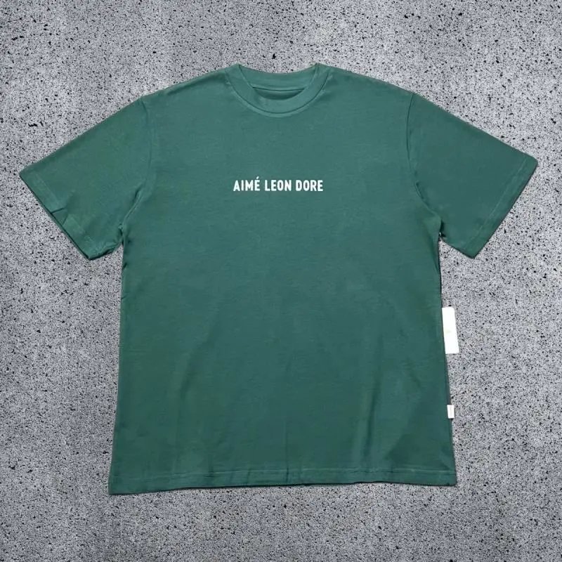 Aimé Leon Dore T-Shirts Short-sleeve logo graphic T-shirt — Green small letter A31