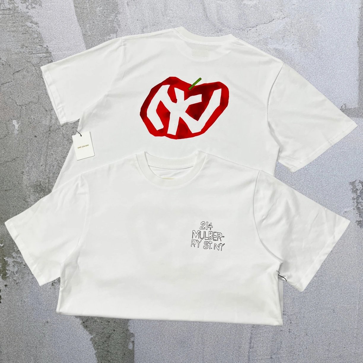 Aimé Leon Dore T-Shirts Short-sleeve logo graphic T-shirt — White NY Apple A09