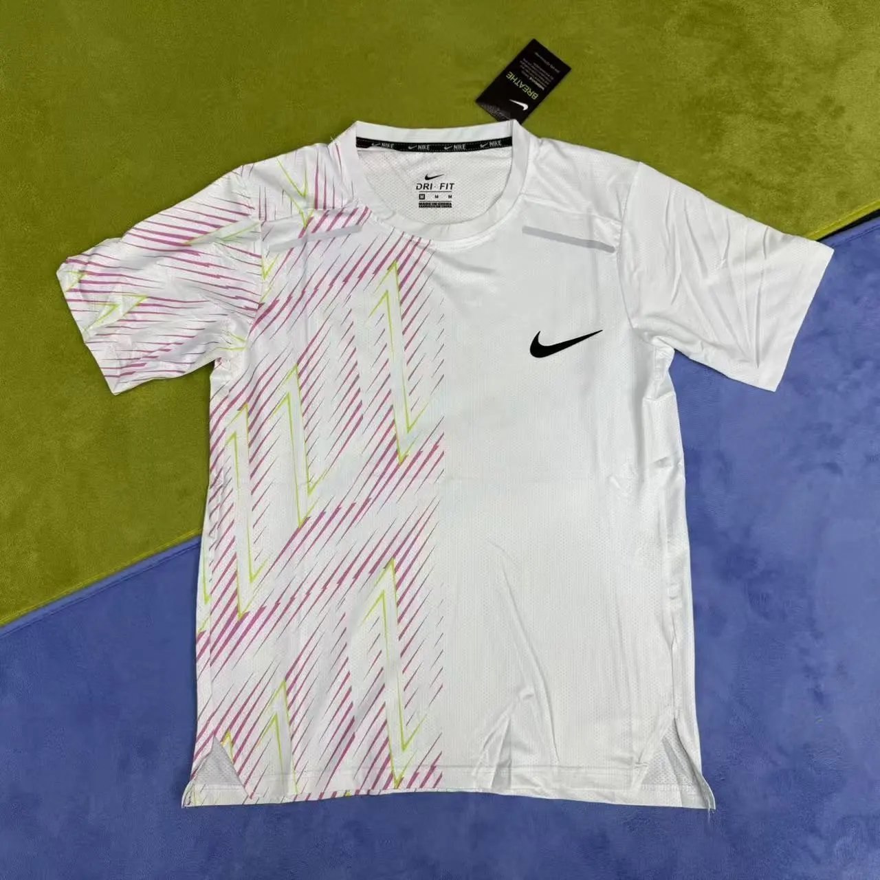 Nike T-Shirts Short-Sleeve Ankle Skeleton Graphic T-Shirt — Pink short-sleeve reflective strip