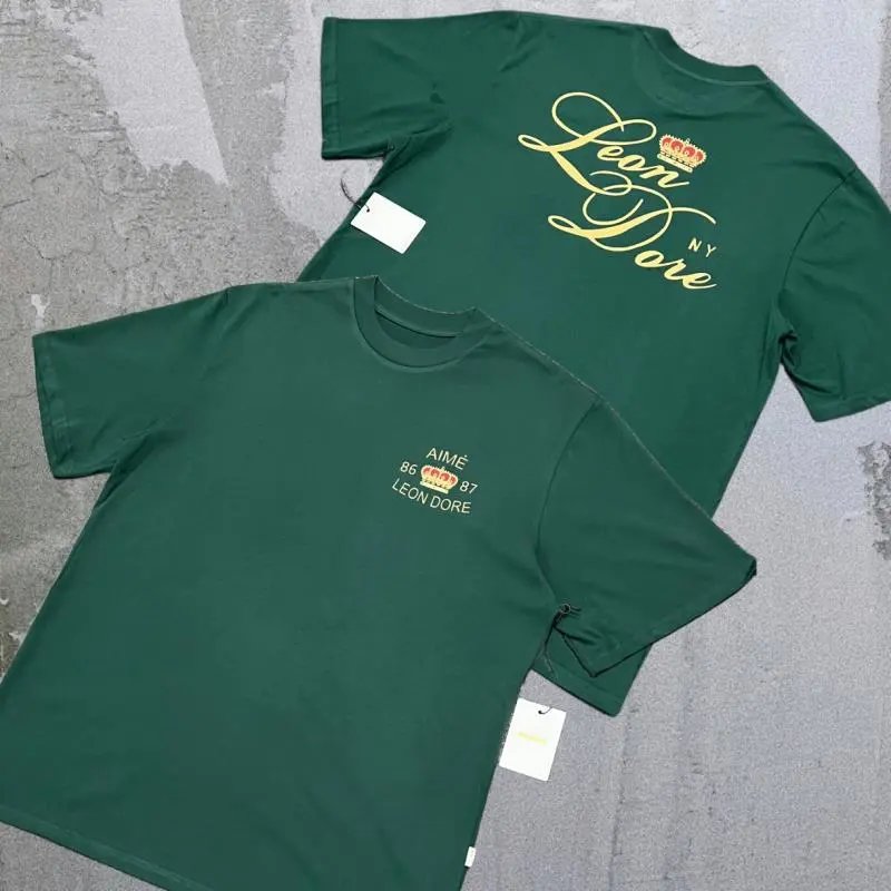 Aimé Leon Dore T-Shirts Short-sleeve logo graphic T-shirt — Green Crown A11
