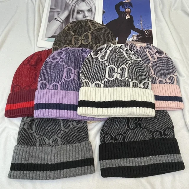 Gucci Hats GG monogram knit beanie with striped ribbed cuff product detail image 1