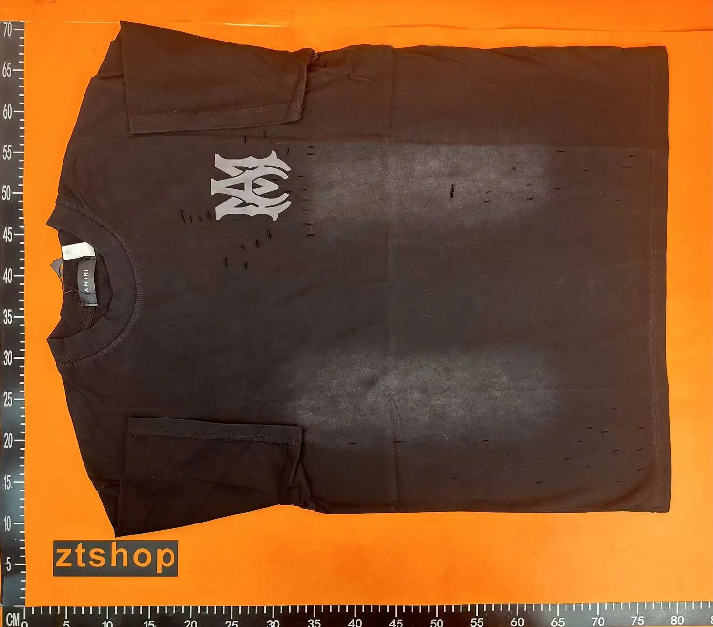 Amiri Tee