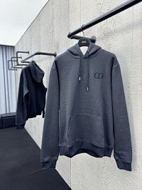 Black pullover hoodie with a black label