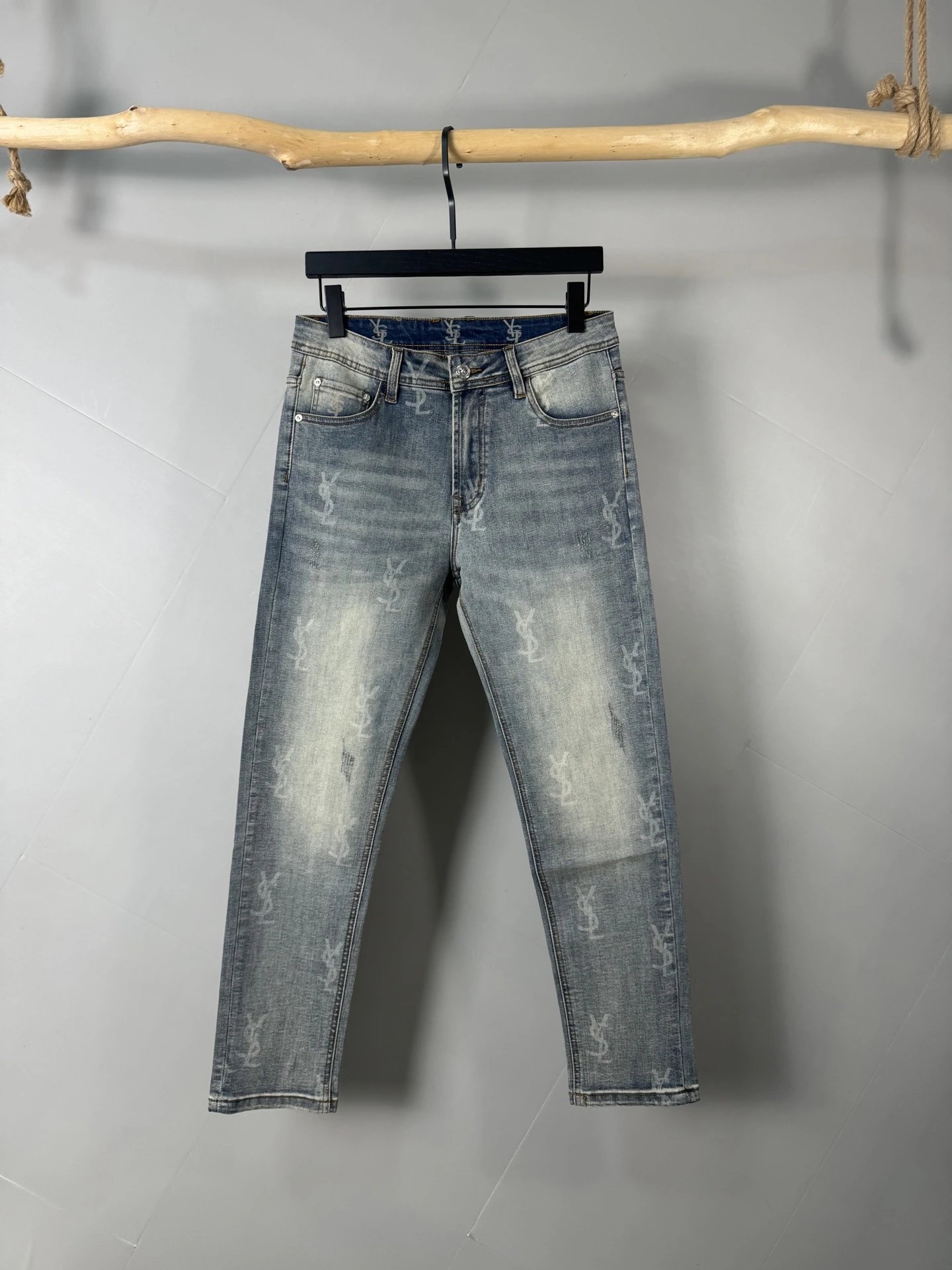 Saint Laurent Jeans High-rise denim with assorted washes and logo-pattern variants image 7