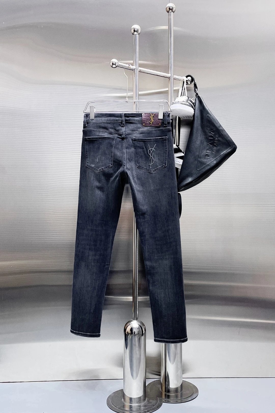 Saint Laurent Jeans High-rise denim with assorted washes and logo-pattern variants image 6