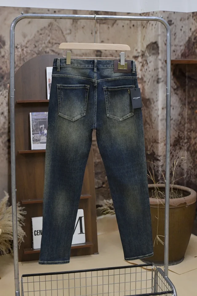 Saint Laurent Jeans High-rise denim with assorted washes and logo-pattern variants product detail image 1