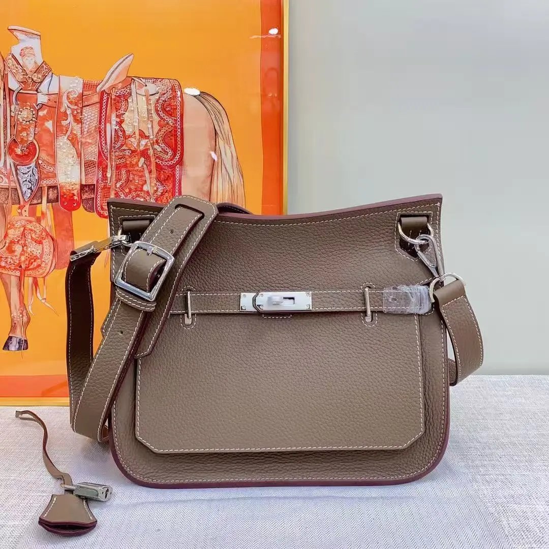 Unbranded Crossbody Bags Front-flap bag with turn-lock closure and wide adjustable strap — 06