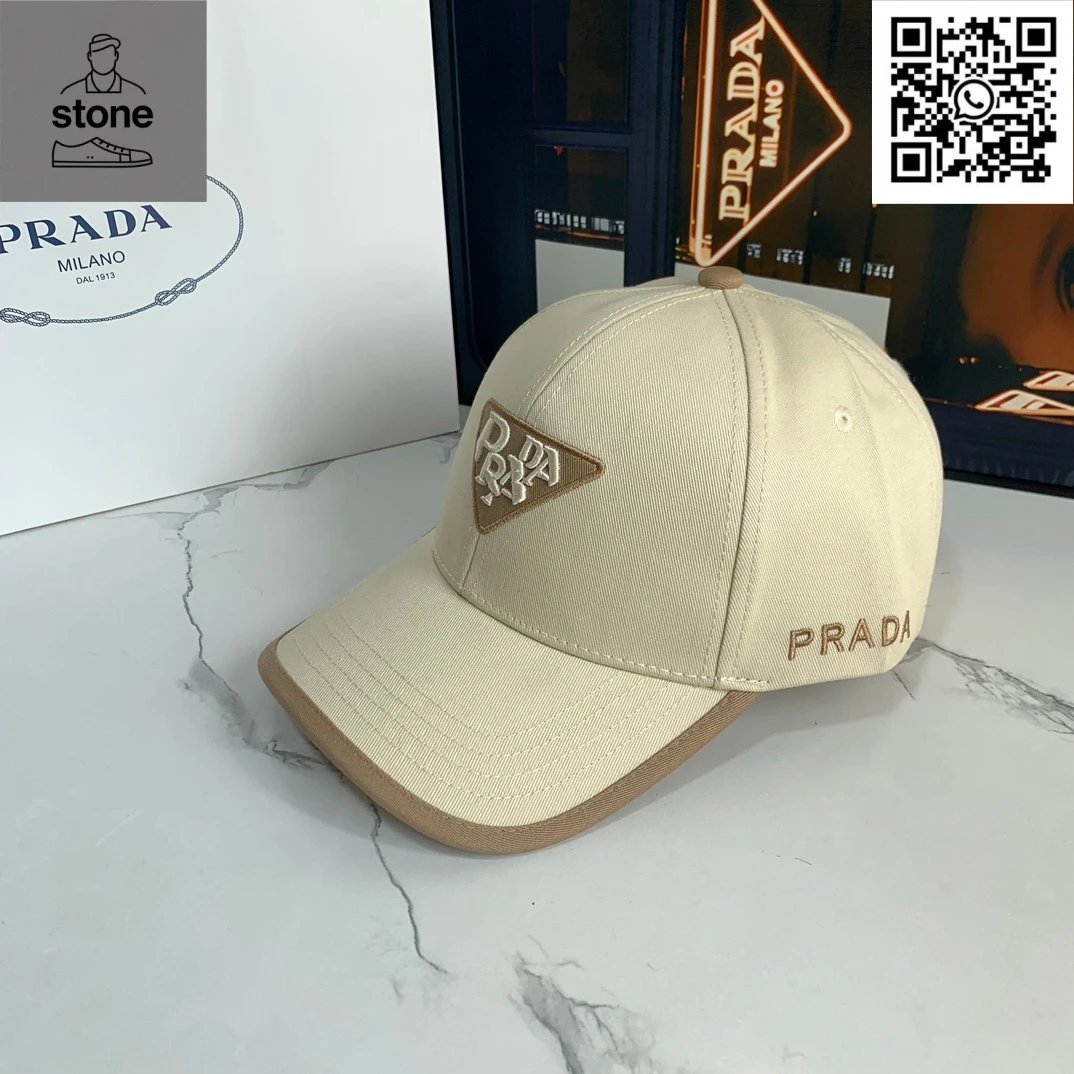 Prada Hats Nylon baseball cap with triangular logo plaque — 24