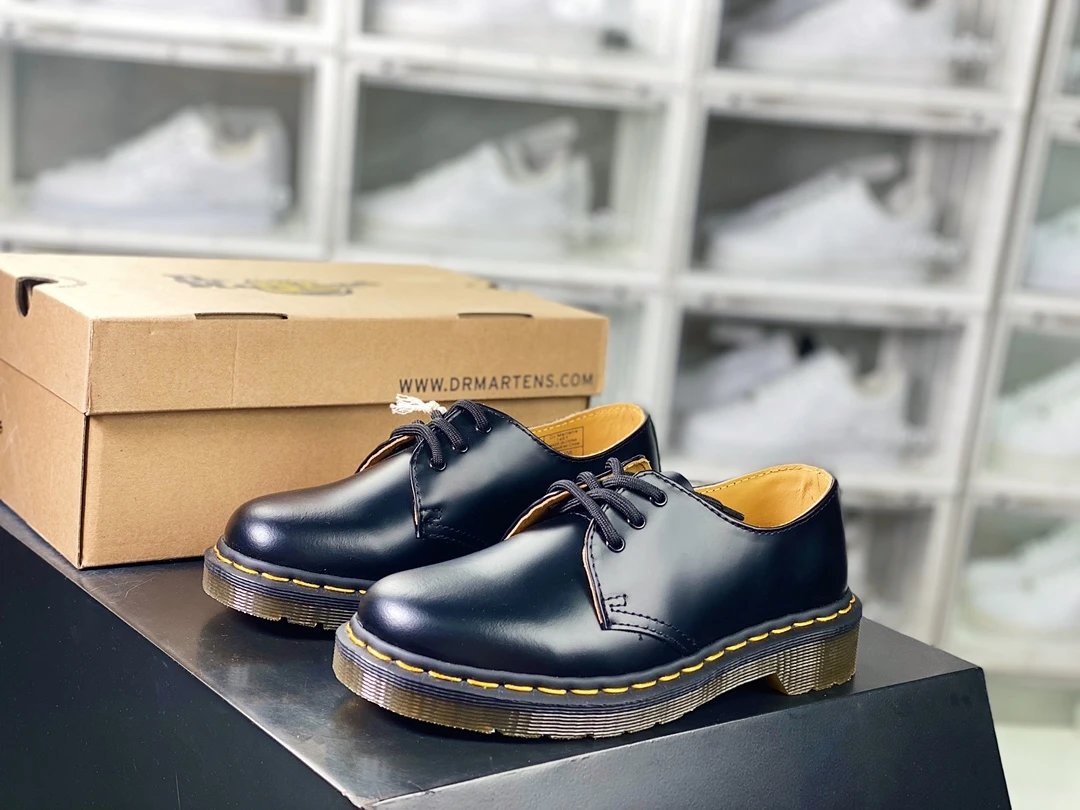Dr. Martens Boots 8-eye lace-up ankle with yellow welt stitching image 10