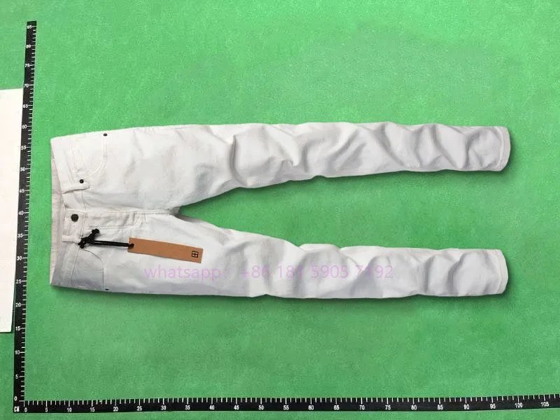 NEW1复古做旧青年休闲牛仔磨破修身小脚裤TOP品质 3
