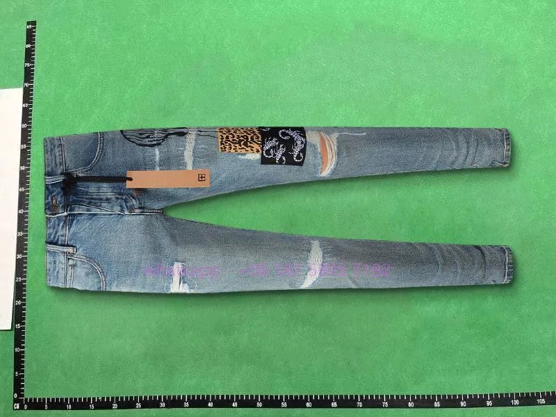 NEW1复古做旧青年休闲牛仔磨破修身小脚裤TOP品质 4