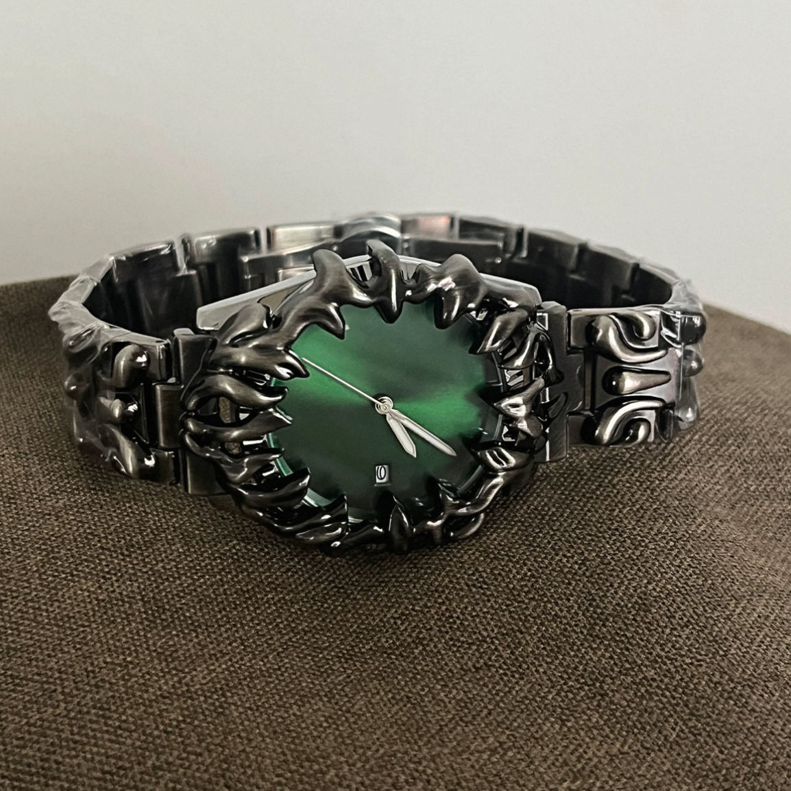 Silver black green surface