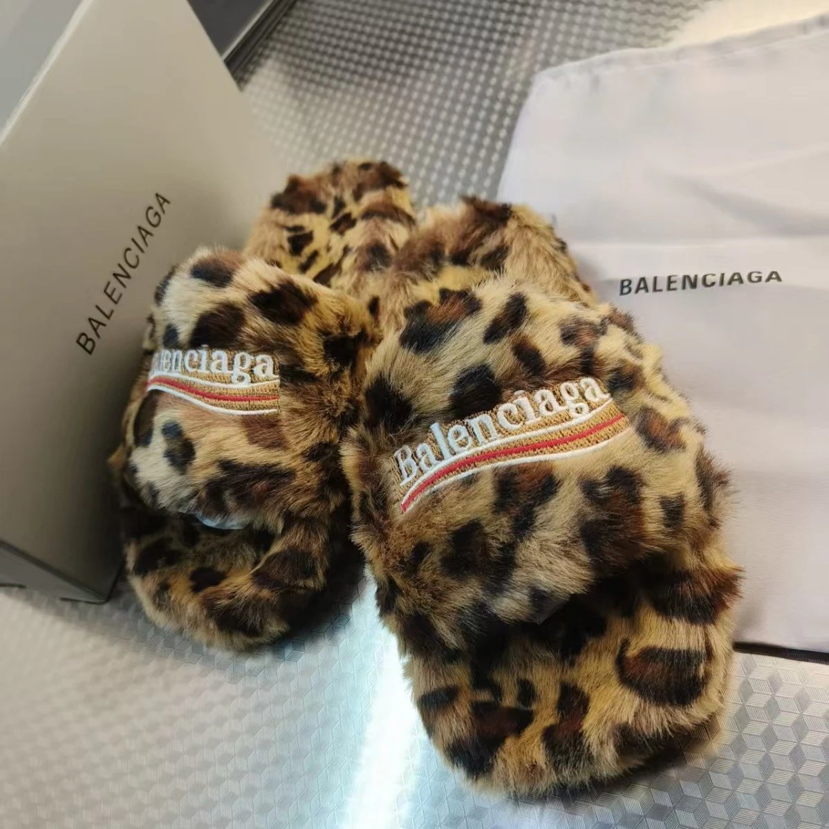 Leopard print fur slippers