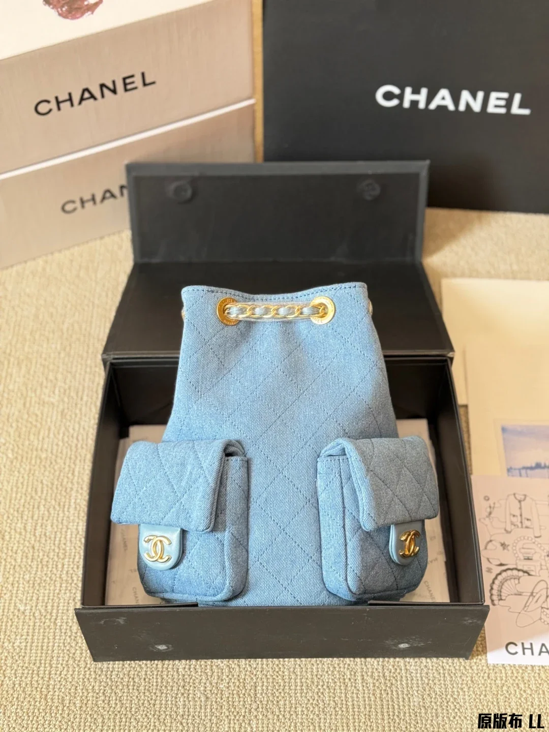 CHANEL Denim Quilted Drawstring Mini Backpack
