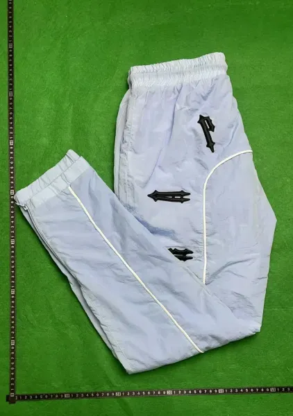 Design Track Pants Light Blue with Black Embroidered Motifs Sweatpants - 1