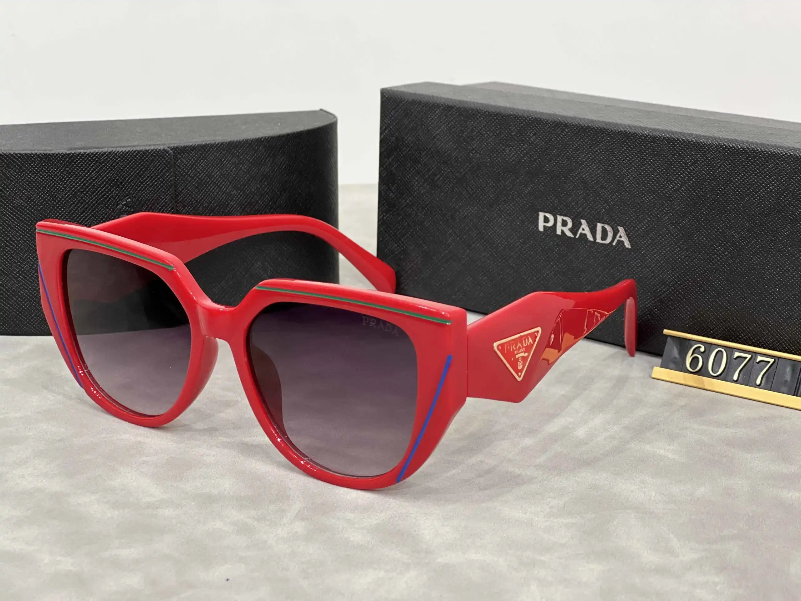 Prada Eyewear Assorted geometric-frame sunglasses with triangle logo plaques image 6