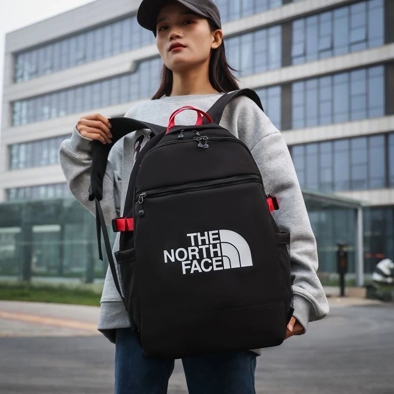 The North Face Backpacks Logo Print Backpack with Front Zip Pocket and Side Mesh Pockets image 4
