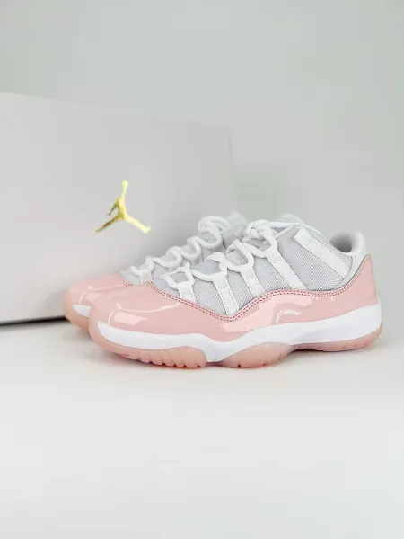 Air Jordan 11 Low Pink Patent Sneakers - 1