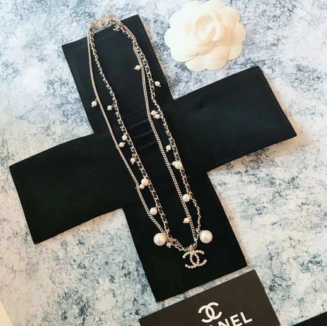 Chanel Pearl embellished Silver-tone Chain Necklace