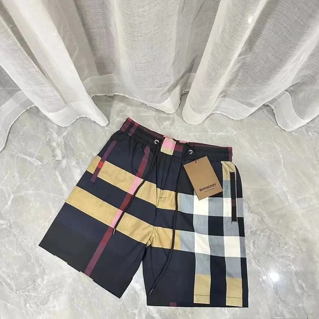 Burberry Swimwear Check-pattern drawstring swim shorts — 18