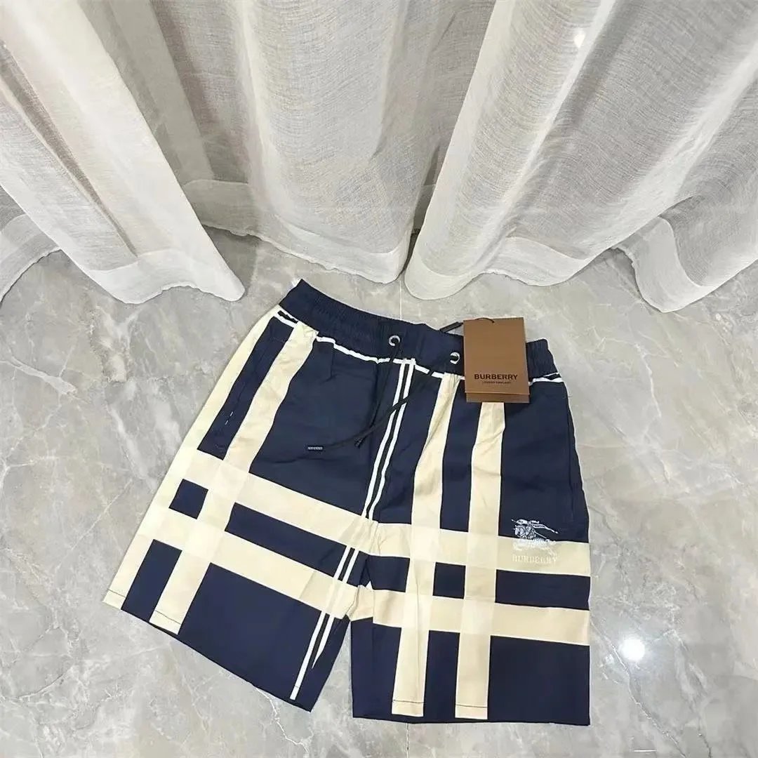 Burberry Swimwear Check-pattern drawstring swim shorts — 19