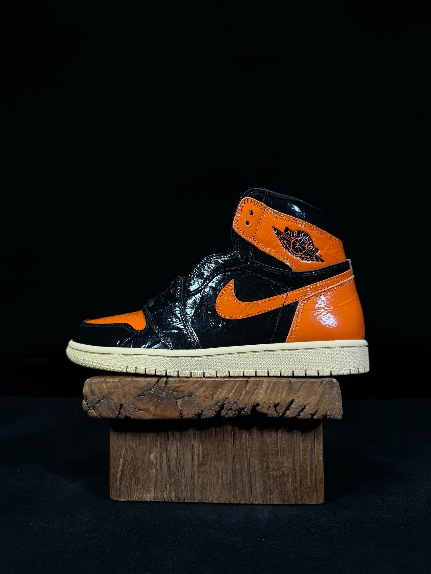 Air Jordan 1 Black Orange Patent Leather Sneakers