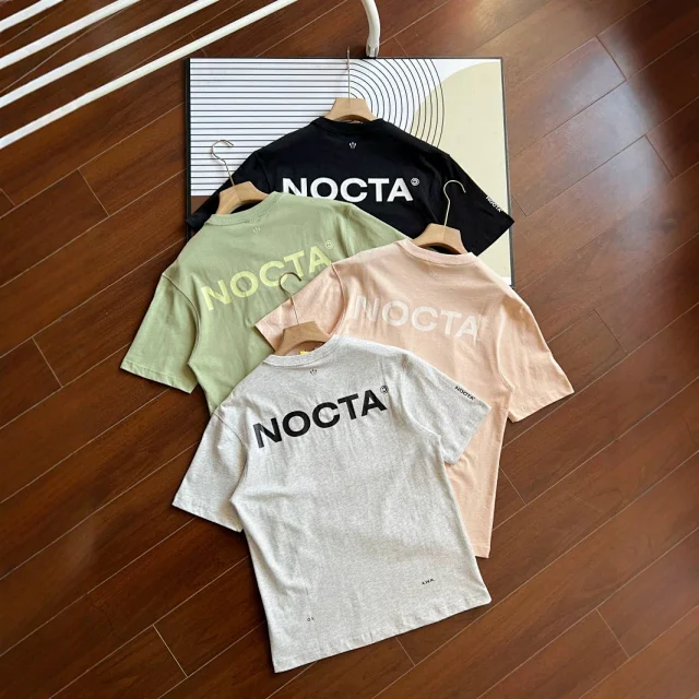 Nike T-Shirts NOCTA logo graphic product detail image 1