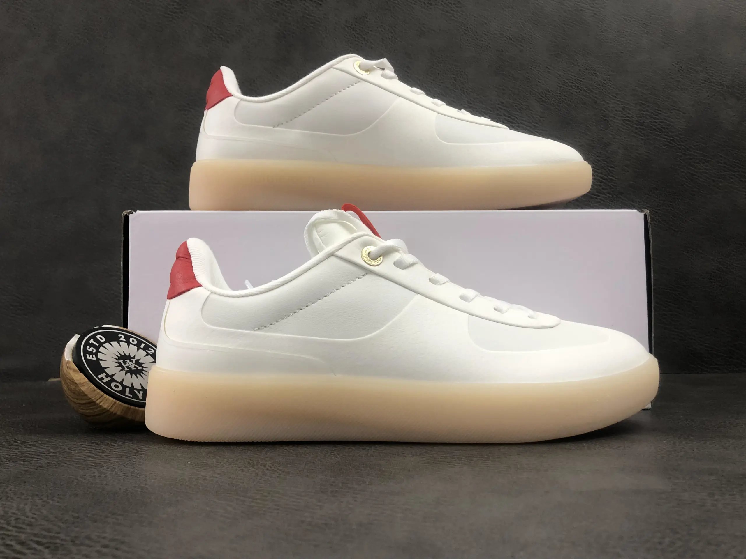 Holy Kicks White Low-Top Sneakers with Red Heel Tab and Gum Sole