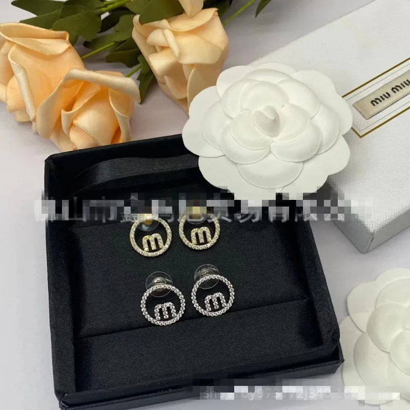 Miu Miu Gold Crystal Circle M Logo Earrings