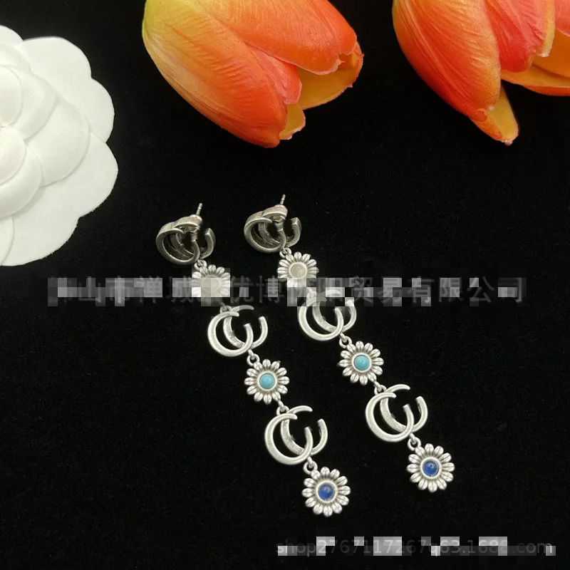 Gucci Silver Crescent Floral Blue Crystal Earrings