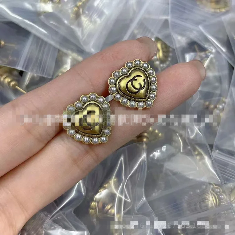Gucci Gold Heart Pearl Vintage Brass Earrings