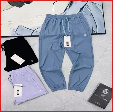 Design Track Pants in Light Blue, Black, and Lavender Sweatpants - 1