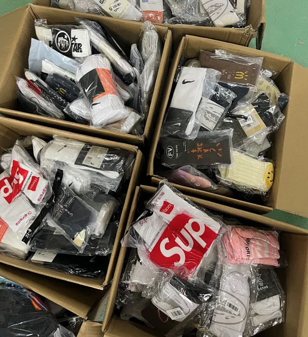 Supreme Box Logo Socks, Nike Swoosh Crew Socks, Off-White Socks, and Assorted Streetwear Socks