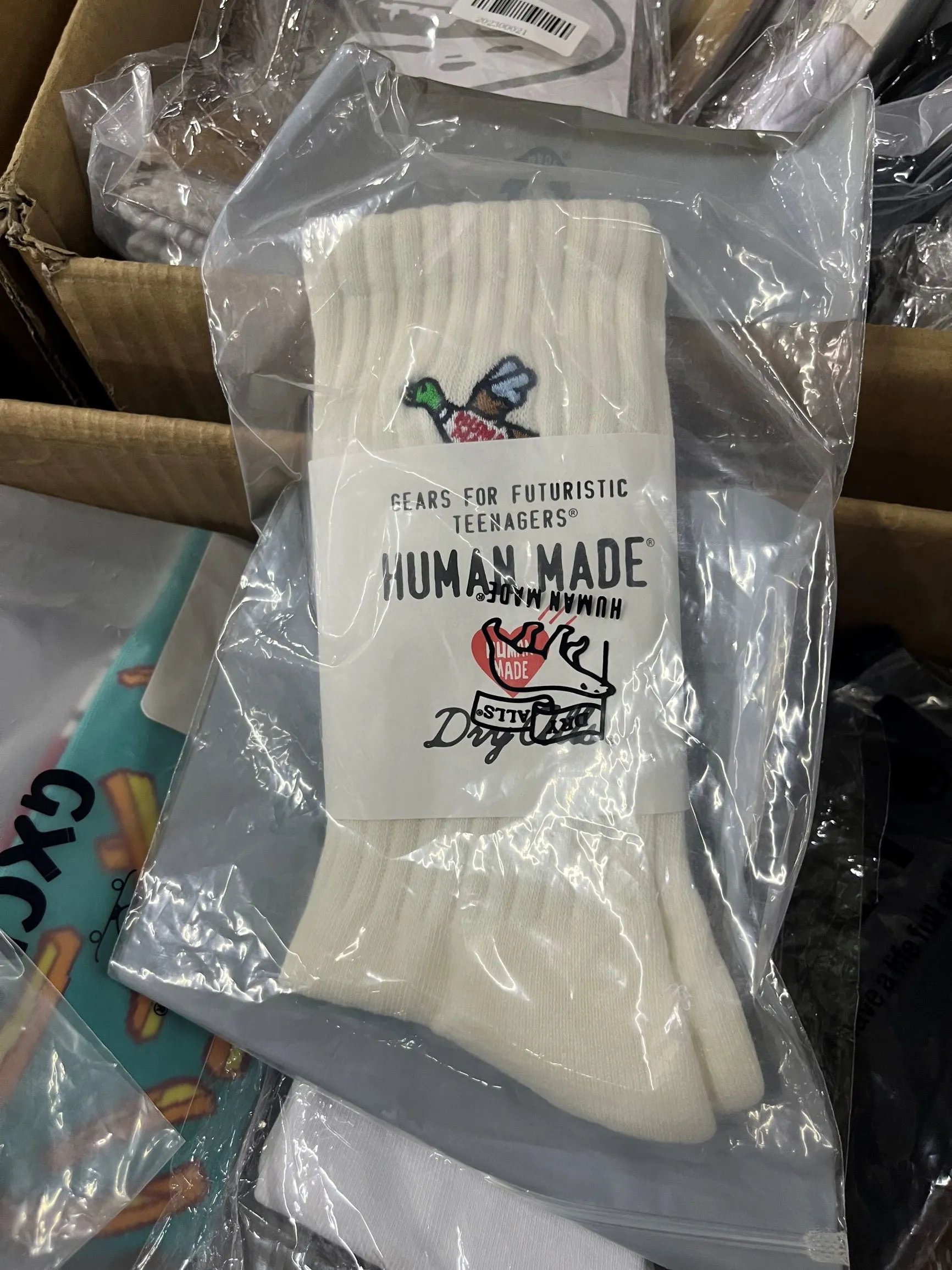 Supreme Box Logo Socks, Nike Swoosh Crew Socks, Off-White Socks, and Assorted Streetwear Socks - 21