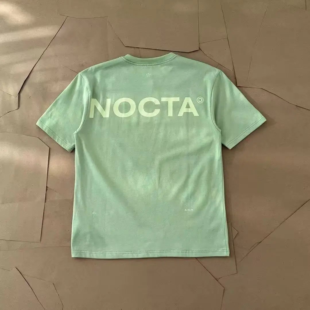 Nike T-Shirts NOCTA Graphic Short-Sleeve T-Shirt — 21