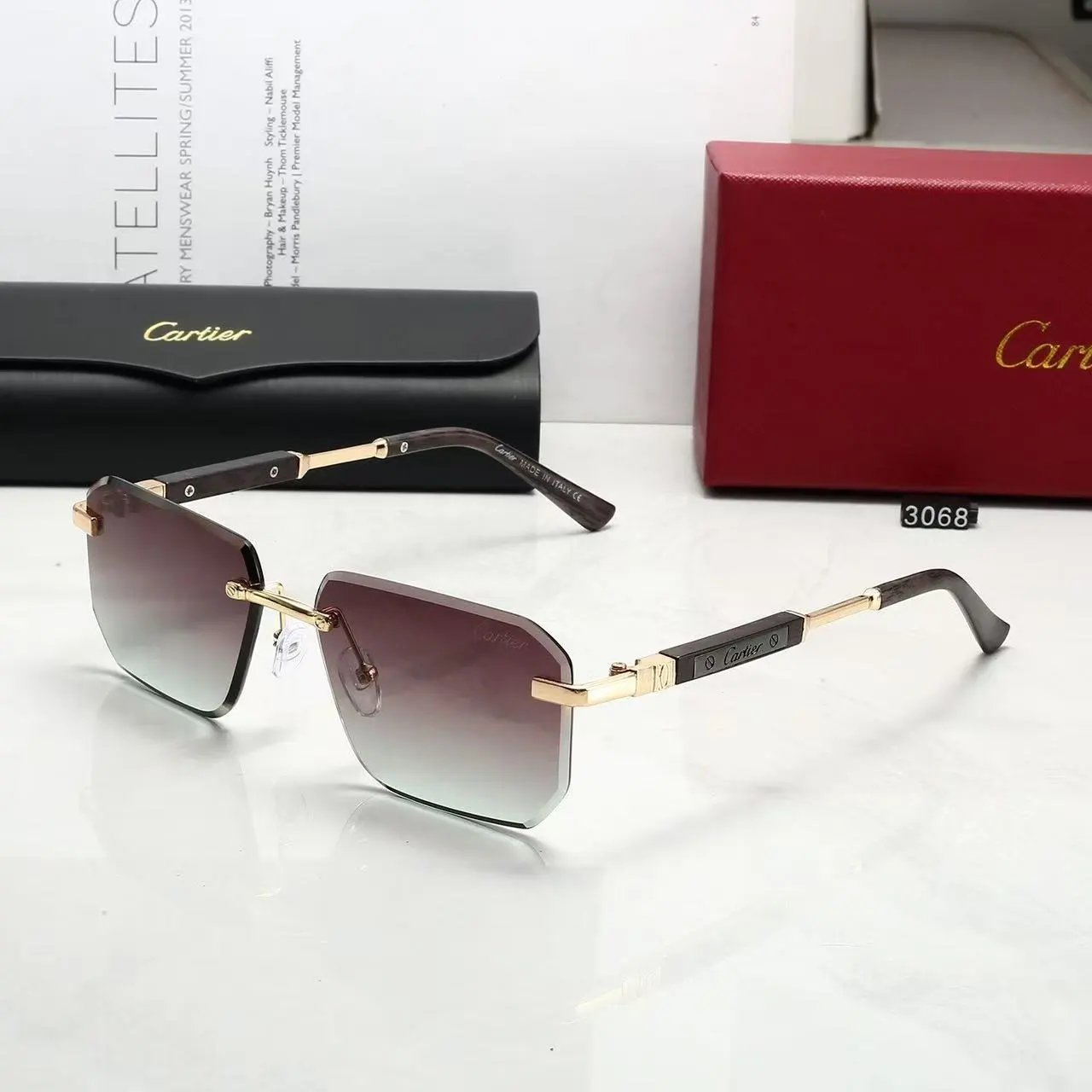 Cartier Eyewear Rimless rectangular sunglasses with gold-tone temples — 31