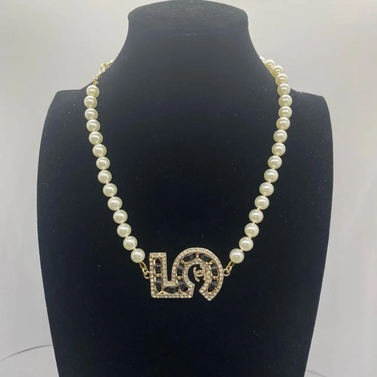 Chanel Jewelry Logo Pendant Necklace — 39