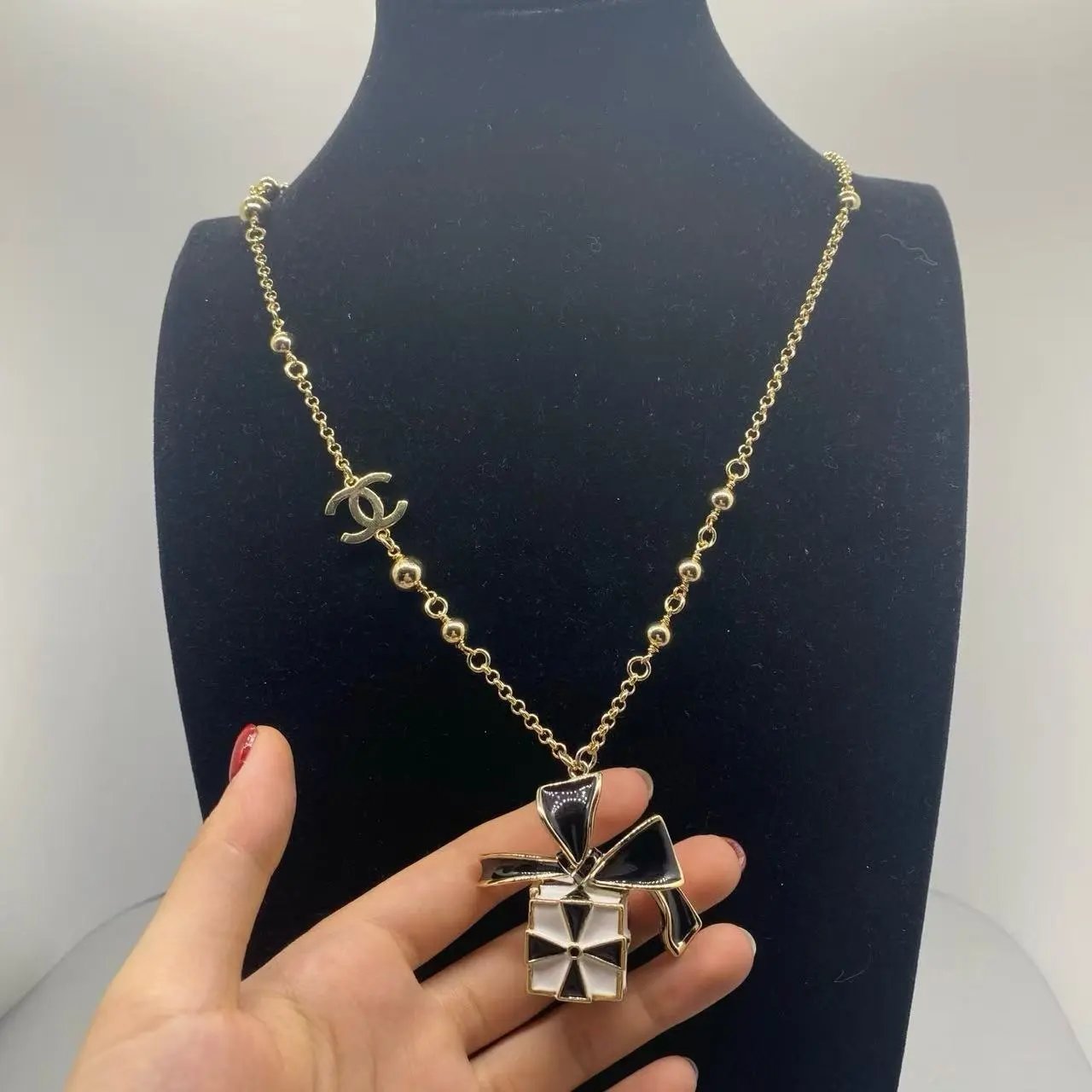 Chanel Jewelry Logo Pendant Necklace — 24